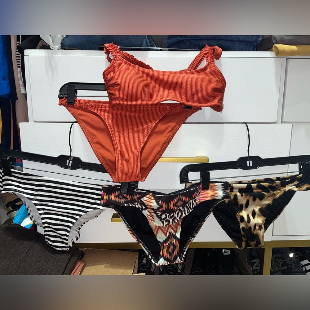 Lot of bikini top &bottoms.Medium top.Small bottoms.Super cute &fun to mix/match